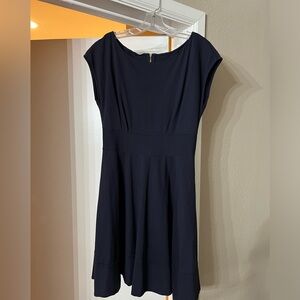 Kate spade size large navy fit and flare dress. Excellent condition.